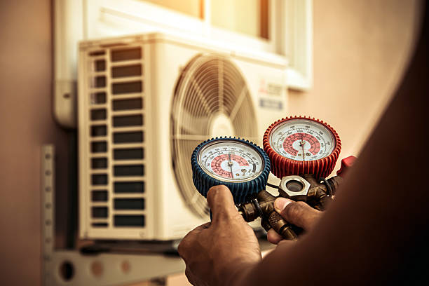 Professional Air Conditioning Service technician working in Orange, TX